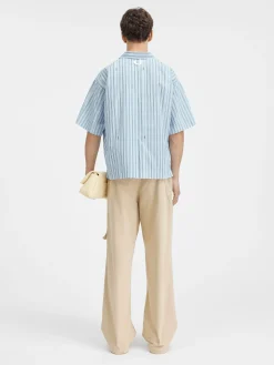 La chemise manches courtes