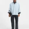 La chemise manches longues