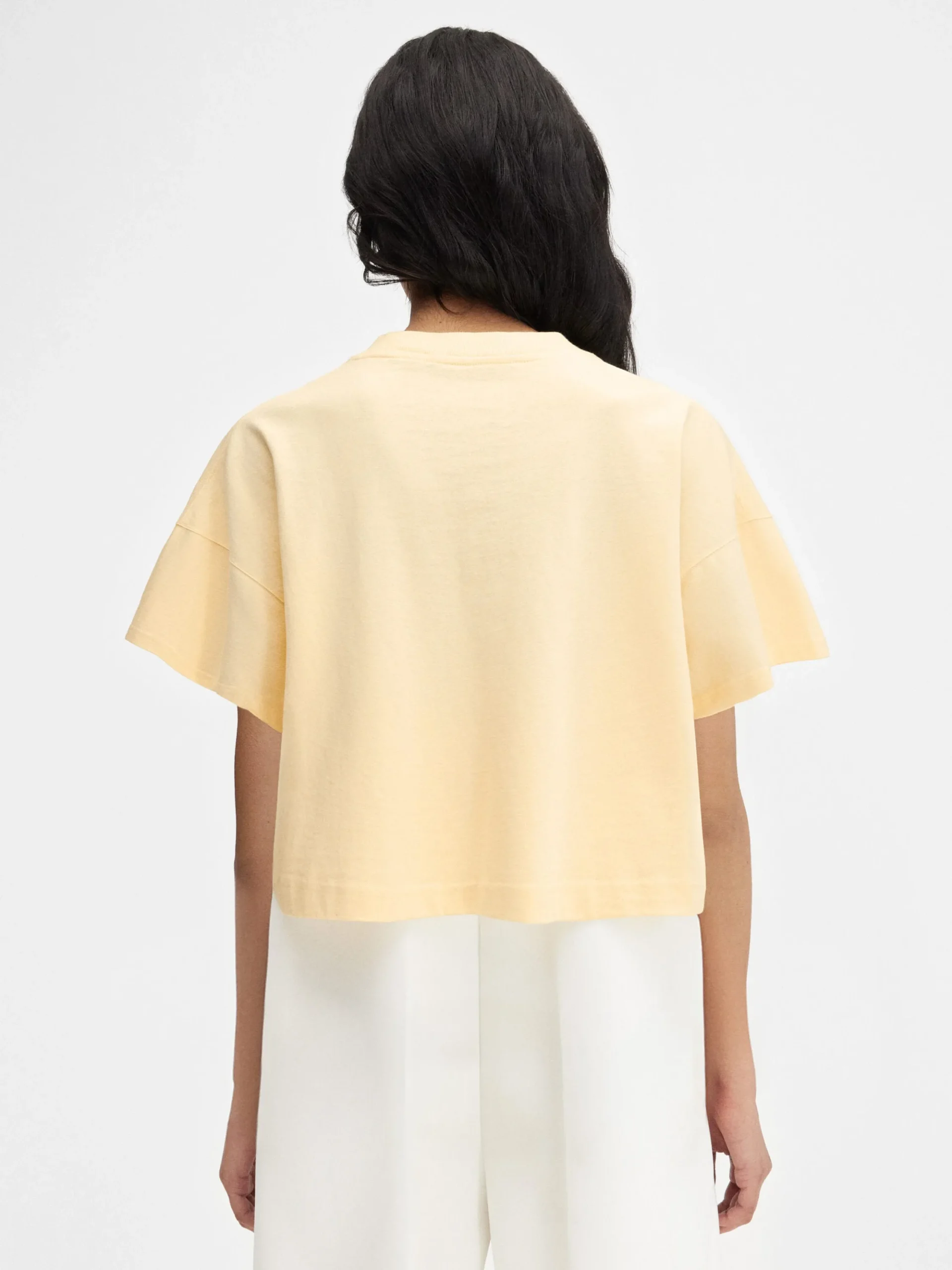 Le t-shirt Corto